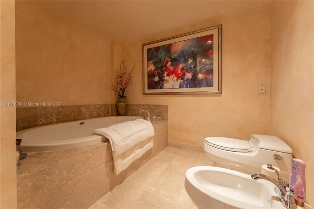 a bathroom with a toilet and a sink