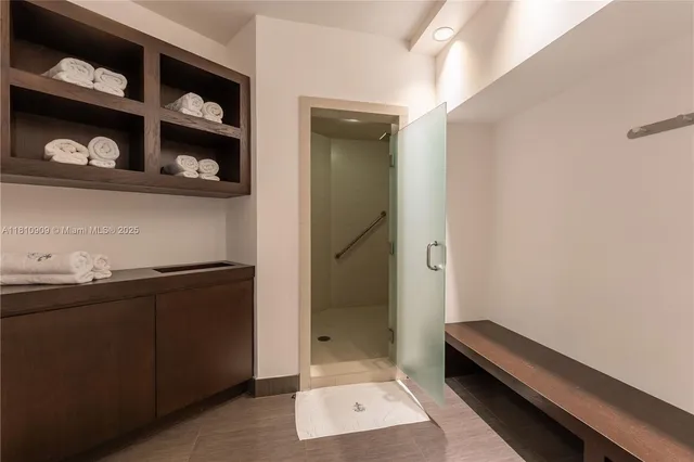 a room with a walk in closet and a window