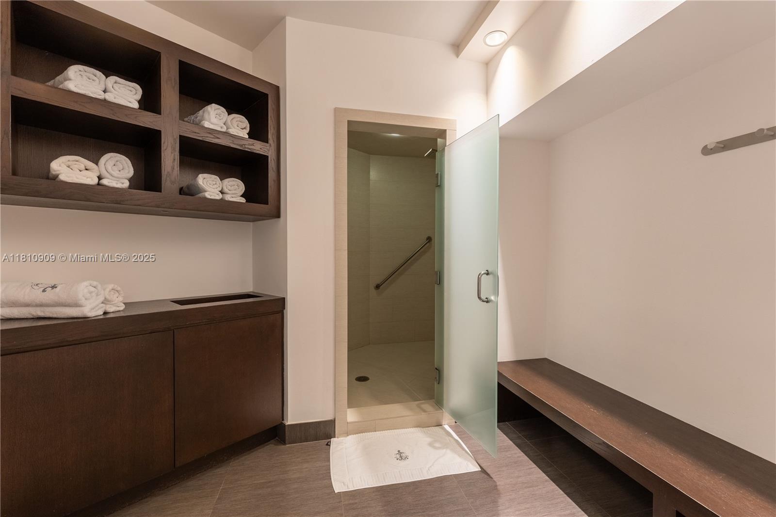 2127 Brickell Avenue, Unit 3304 Miami, FL 33129 - Photo 34 of 39 a room with a walk in closet and a window