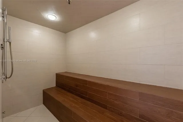 a view of room with racks on the wall