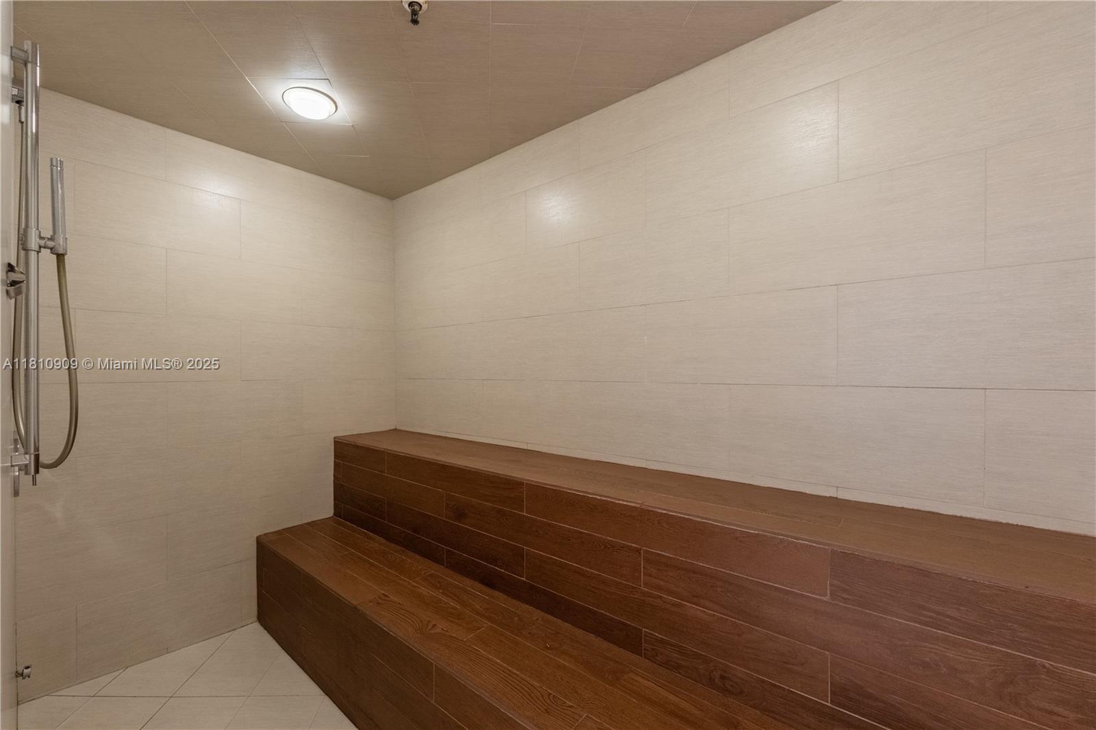 2127 Brickell Avenue, Unit 3304 Miami, FL 33129 - Photo 35 of 39 a view of room with racks on the wall