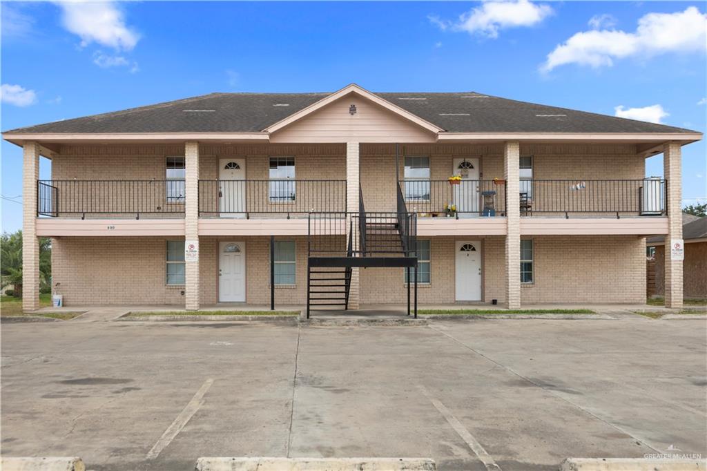 a front view of a house with a porch