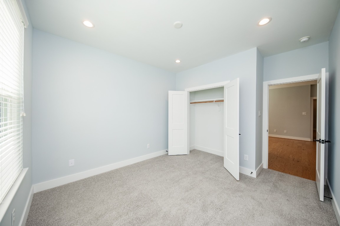 1860 West Tidwell Road Houston, TX 77091 - Photo 19 of 32 an empty room with closet and a window