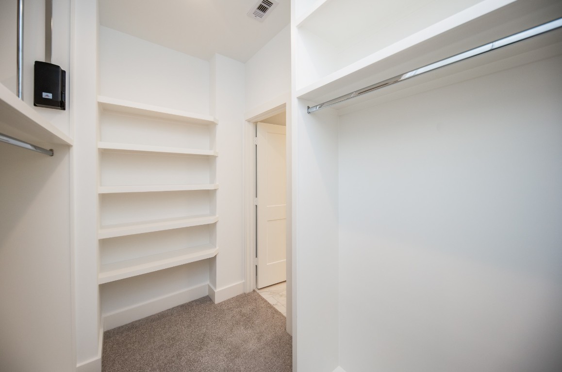 1860 West Tidwell Road Houston, TX 77091 - Photo 27 of 32 a view of an empty walk in closet