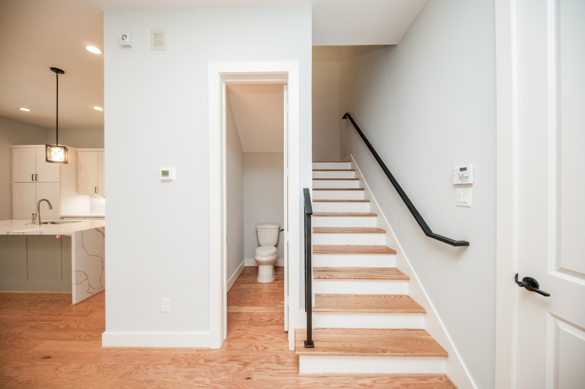 1860 West Tidwell Road Houston, TX 77091 - Photo 7 of 32 a view of an entryway with wooden floor and a bathroom view