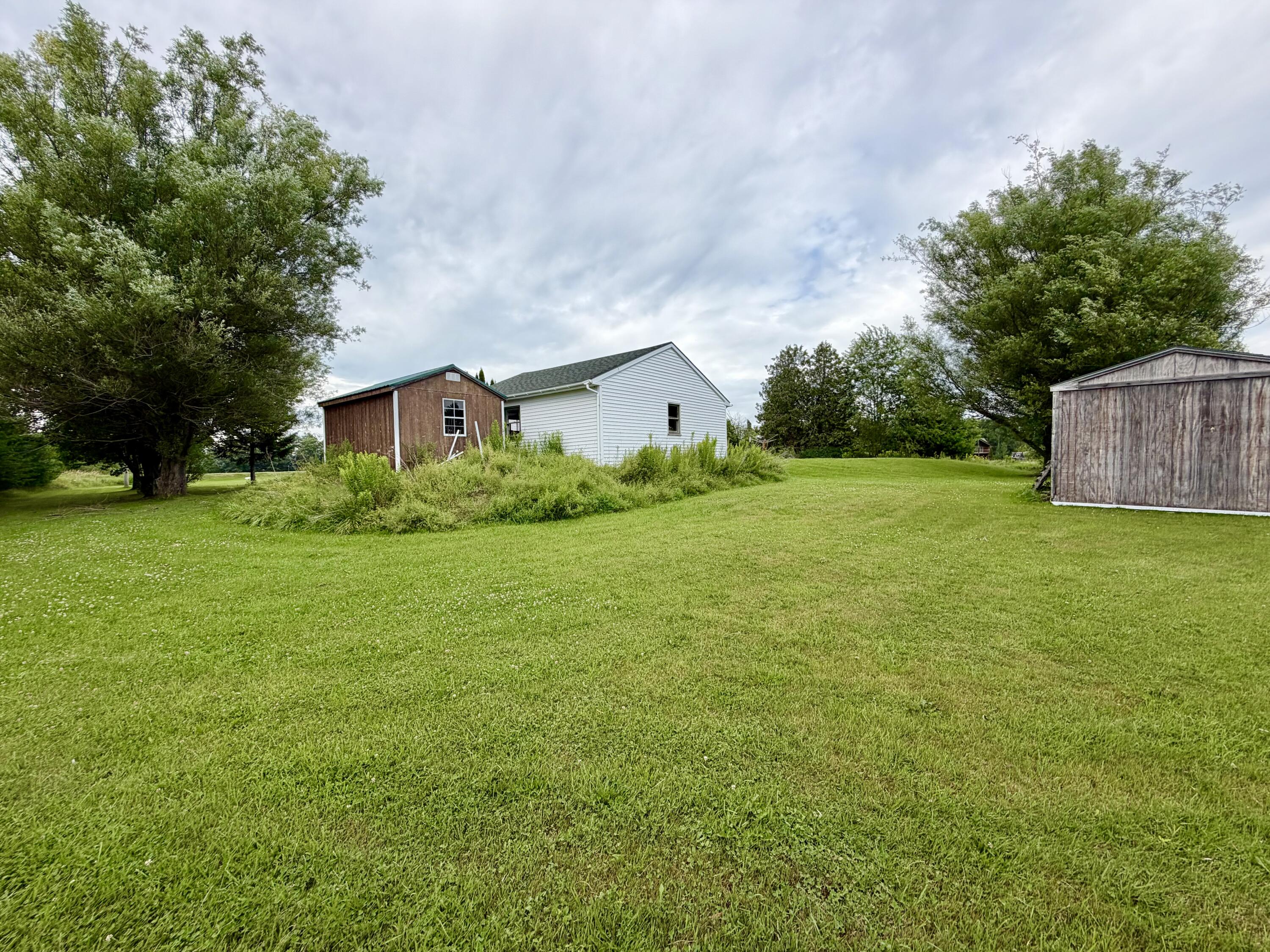 142 Lake Road Levant, ME 04456 - Photo 18 of 54 Backyard
