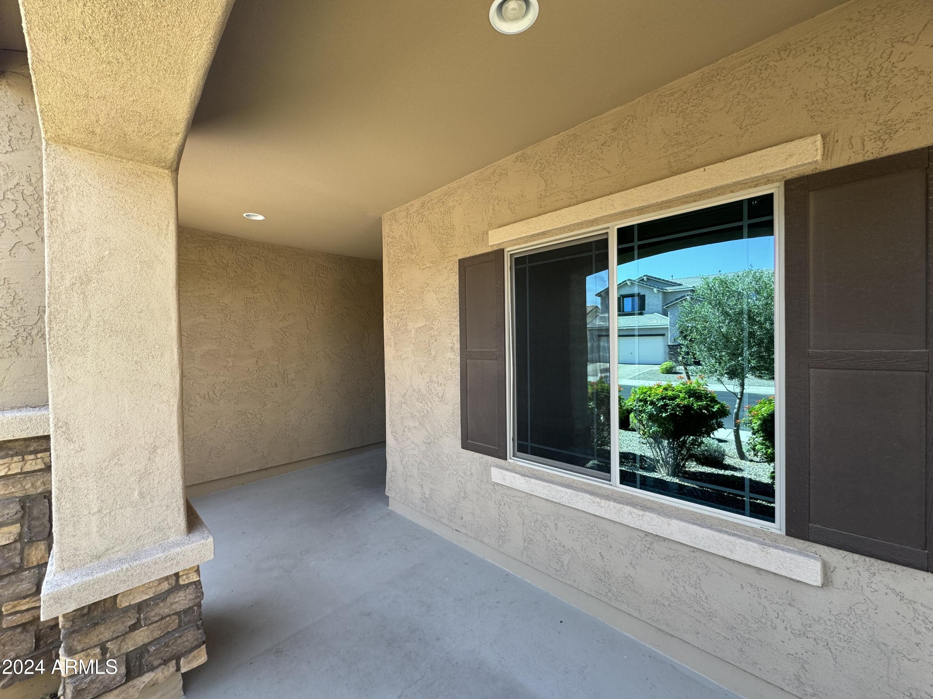 20226 North 260th Drive Buckeye, AZ 85396 - Photo 10 of 109 Front Covered Porch