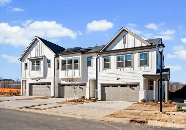 a front view of a house with a porch
