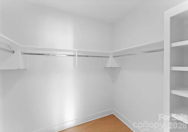 a view of a room with racks on the wall