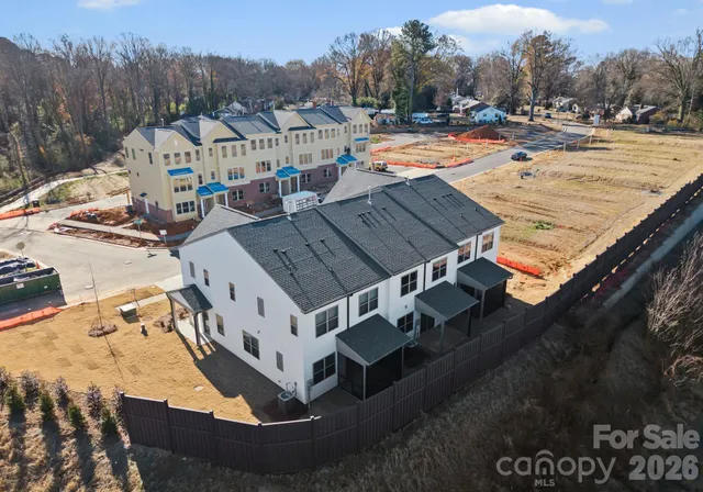a view of a house with outdoor space and sitting area