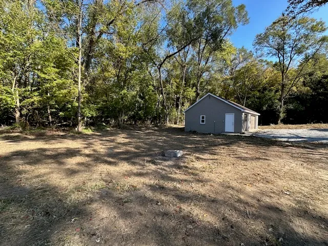 a house view with a outdoor space