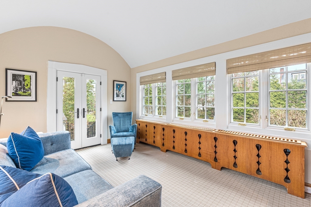 409 Heath Street Brookline, MA 02467 - Photo 11 of 29 a living room with furniture and windows