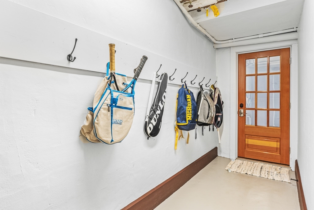 409 Heath Street Brookline, MA 02467 - Photo 26 of 29 a view of a room with rack and white walls