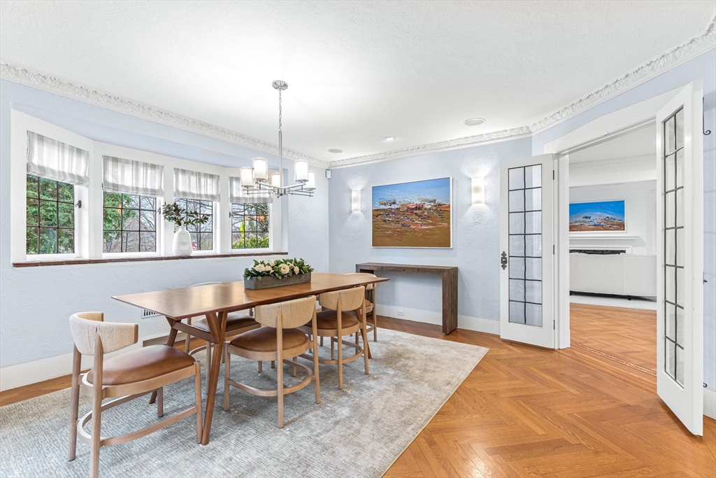 409 Heath Street Brookline, MA 02467 - Photo 6 of 29 a dining room with furniture and window