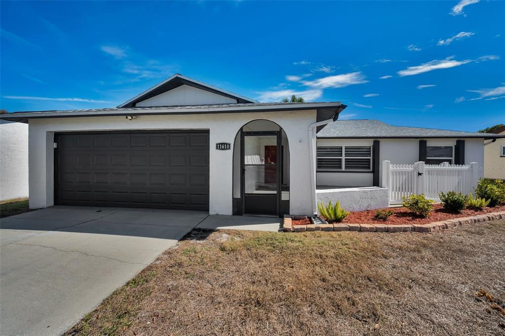 11610 Bee Hive Lane Port Richey, FL 34668 - Photo 1 of 18