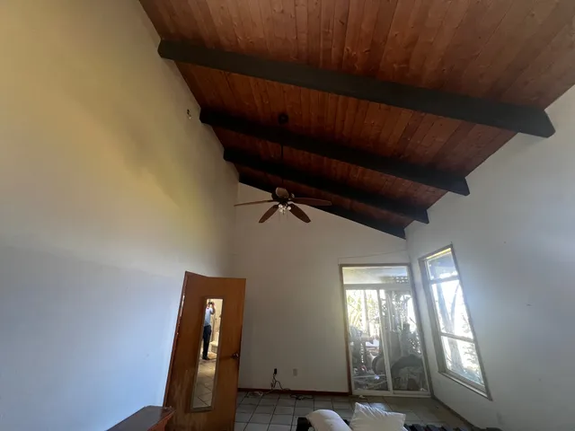 an empty room with windows