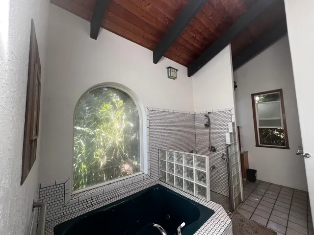 a bathroom with a sink and a shower