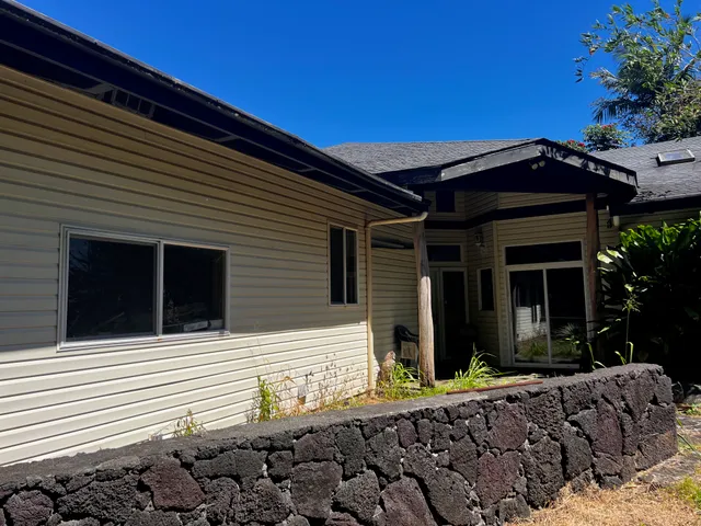 a view of empty room with windows