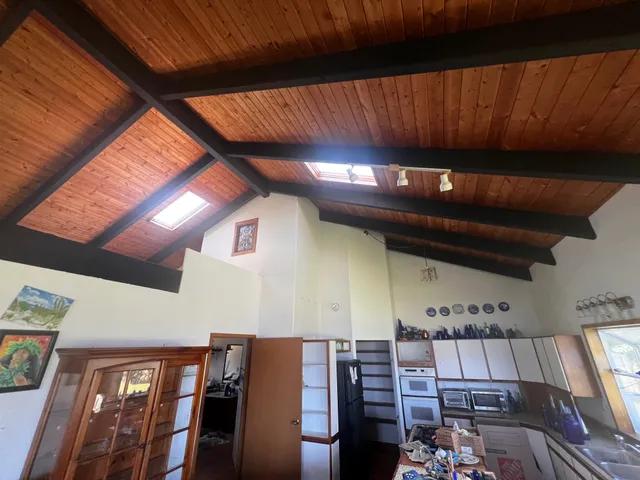 a view of a swimming pool in the backyard