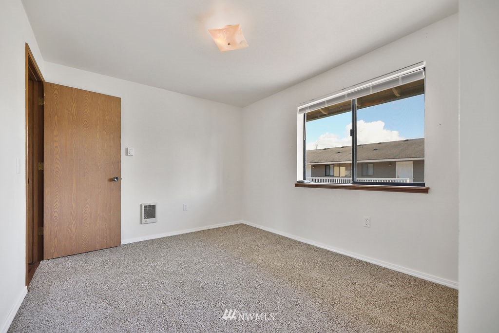 311 Date Street Sultan, WA 98294 - Photo 16 of 29 a view of an empty room with a window