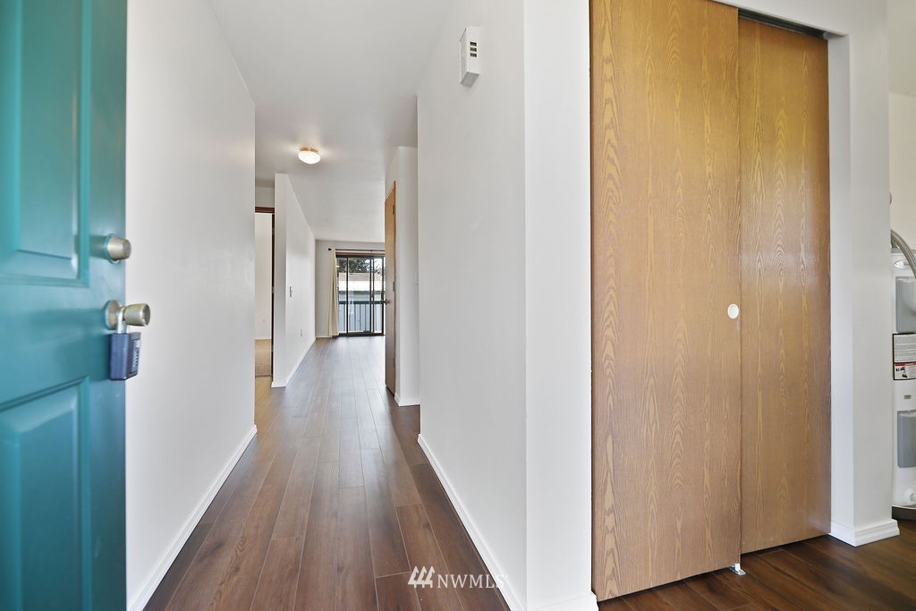311 Date Street Sultan, WA 98294 - Photo 4 of 29 a view of a hallway with wooden floor