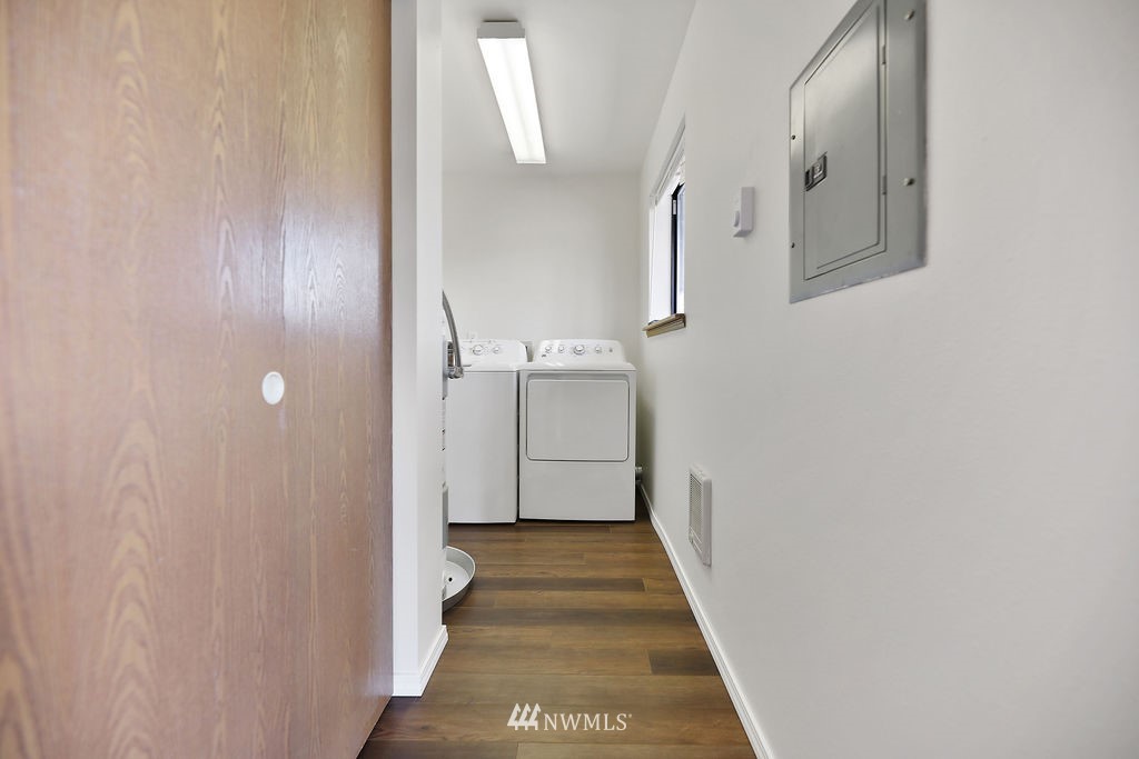 311 Date Street Sultan, WA 98294 - Photo 5 of 29 a view of a hallway with wooden floor and staircase