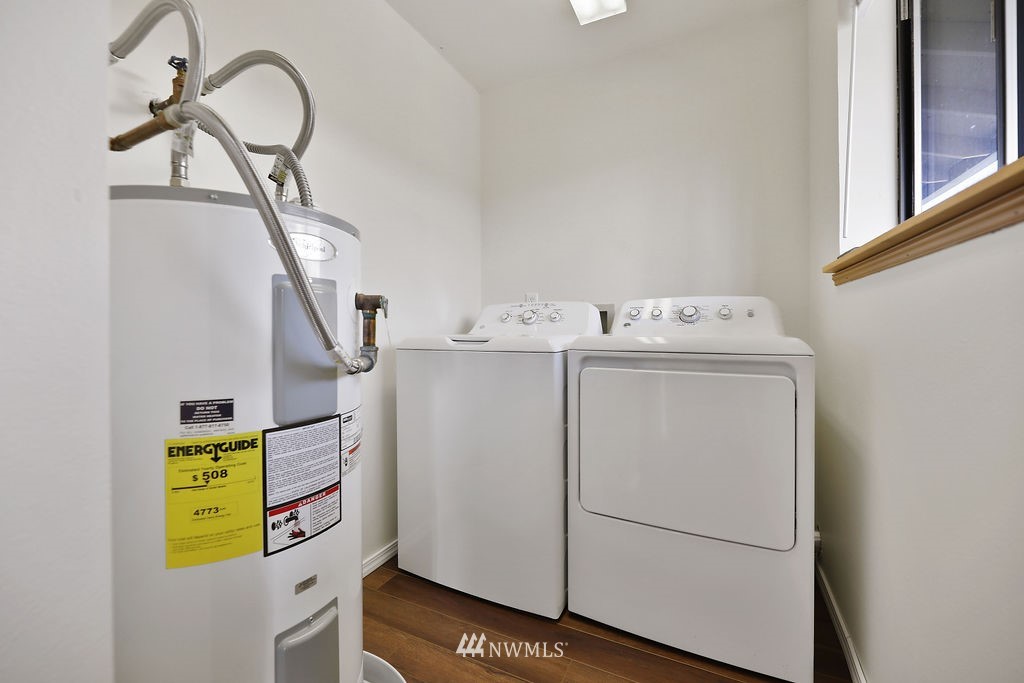 311 Date Street Sultan, WA 98294 - Photo 6 of 29 a utility room with dryer and washer
