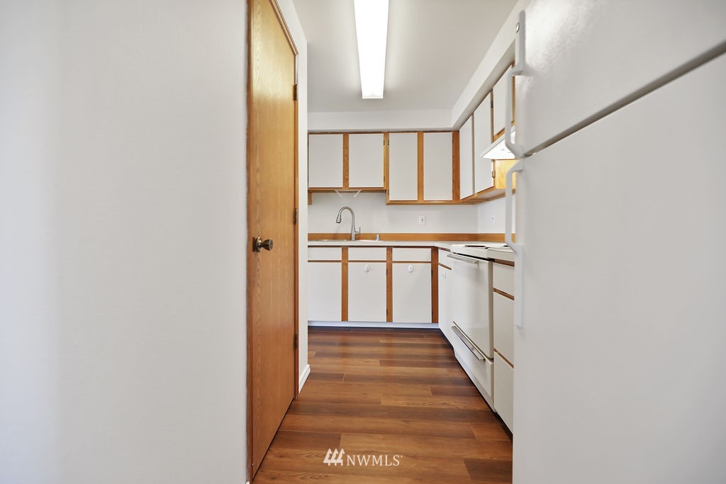 311 Date Street Sultan, WA 98294 - Photo 7 of 29 a view of a hallway with wooden floor