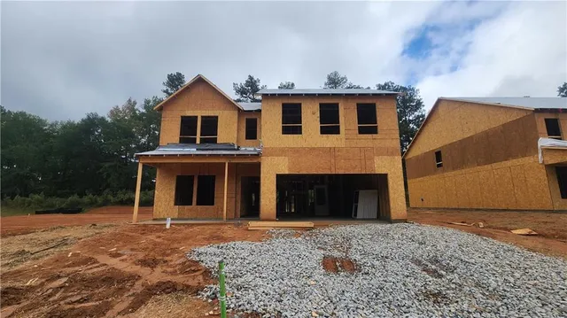 a view of a yard in front of a house