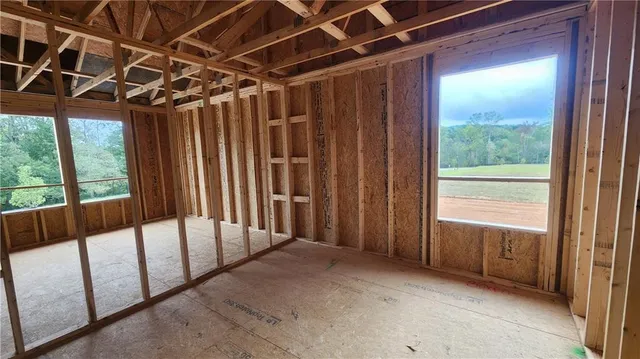 a view of a room with wooden walls