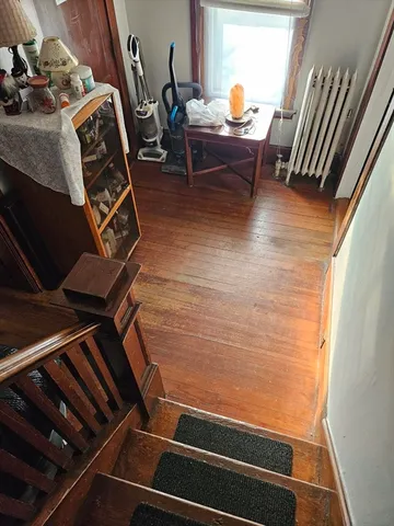 a living room with chairs