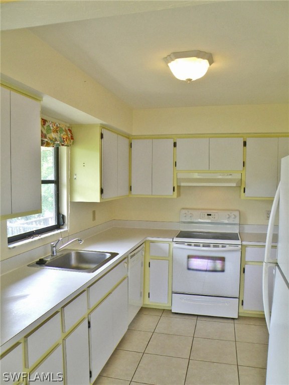 1439 Albatross Road Sanibel, FL 33957 - Photo 5 of 21 a kitchen with a sink cabinets and window