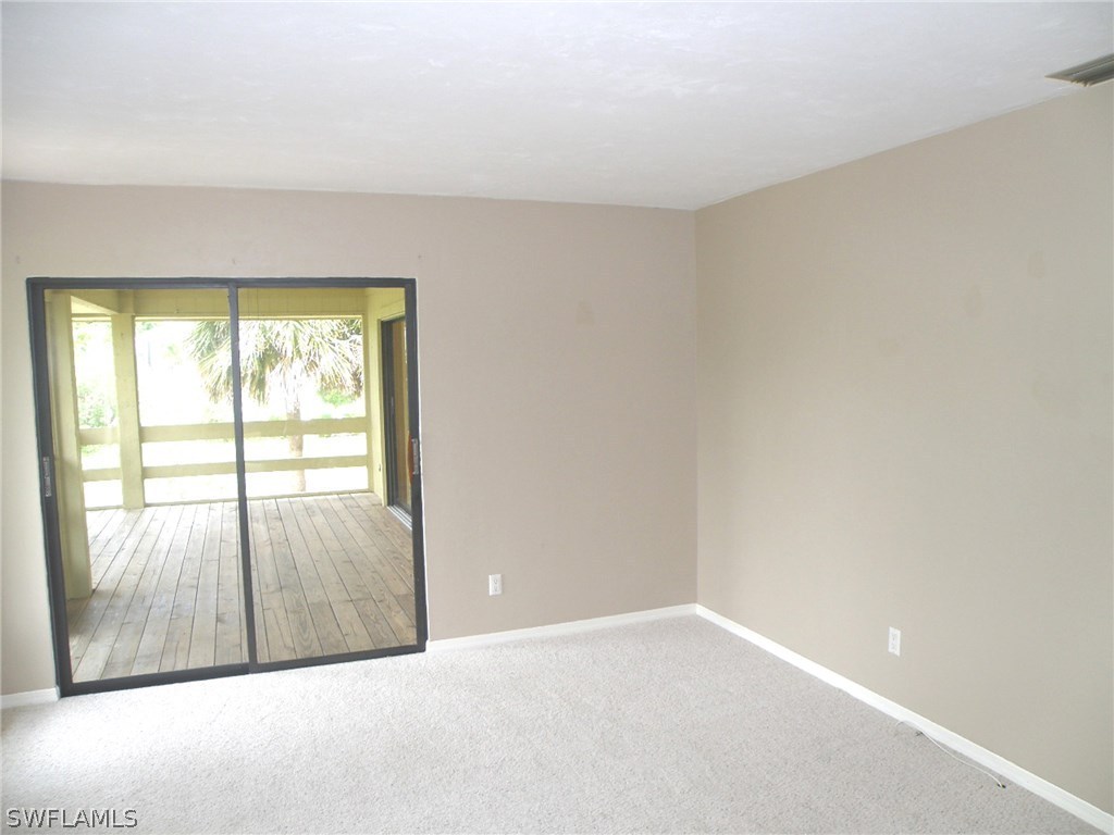 1439 Albatross Road Sanibel, FL 33957 - Photo 7 of 21 a view of an empty room and window