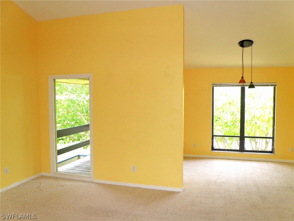 1439 Albatross Road Sanibel, FL 33957 - Photo 8 of 21 a view of an empty room with a window