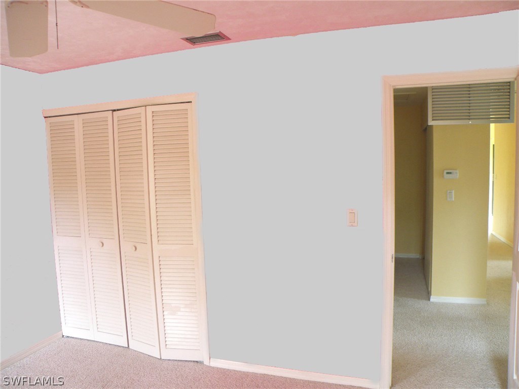 1439 Albatross Road Sanibel, FL 33957 - Photo 10 of 21 a view of an empty room with closet and a window
