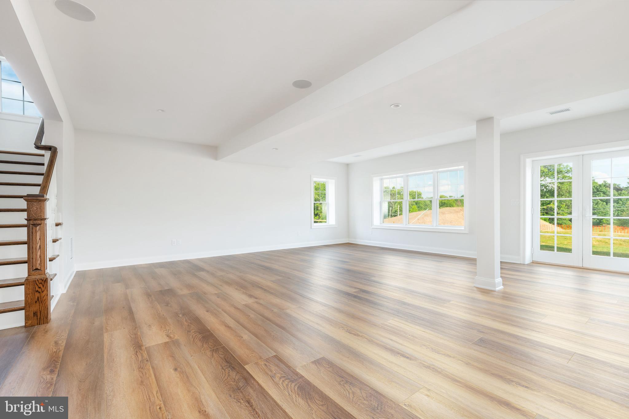 427 Radnor Street Road Wayne, PA 19087 - Photo 15 of 36 wooden floor in an empty room with a window