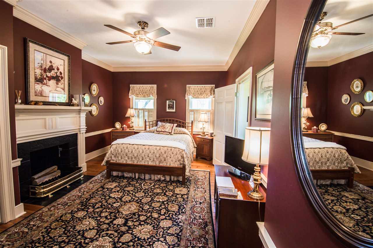 6389 Spring Creek Road Bridgewater, VA 22812 - Photo 31 of 41 a living room with furniture fireplace and flat screen tv