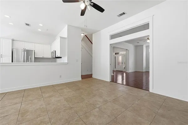 a view of a kitchen with a sink and cabinets