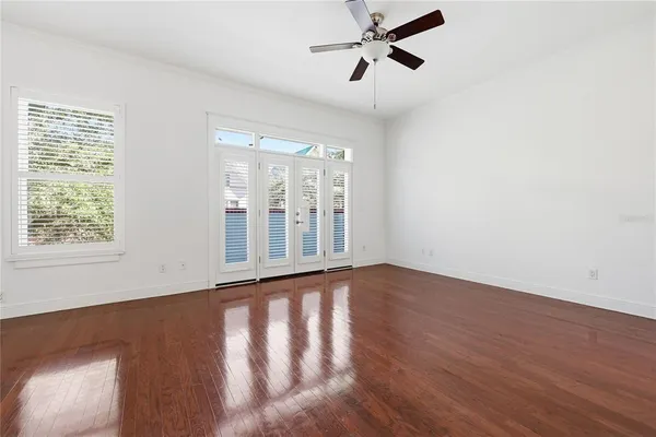 a bedroom with double bed and a couch
