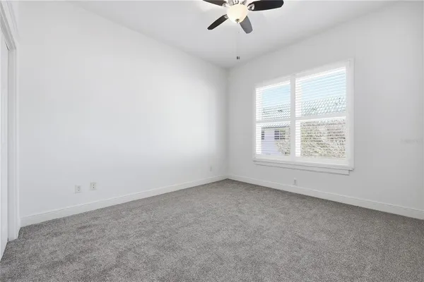 an empty room with a natural light