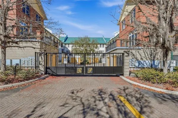 a view of a brick wall of the house