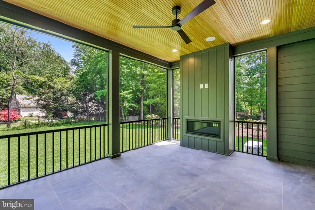a view of backyard with green space