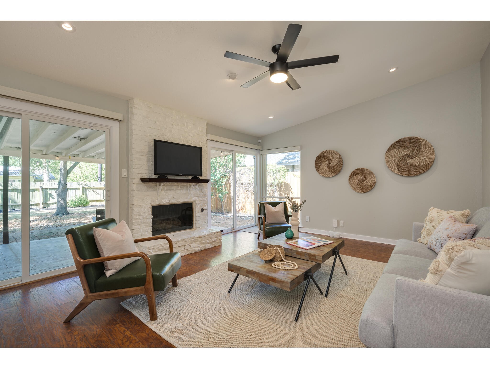 3203 Foster Lane Austin, TX 78757 - Photo 14 of 37 a living room with furniture and a fireplace
