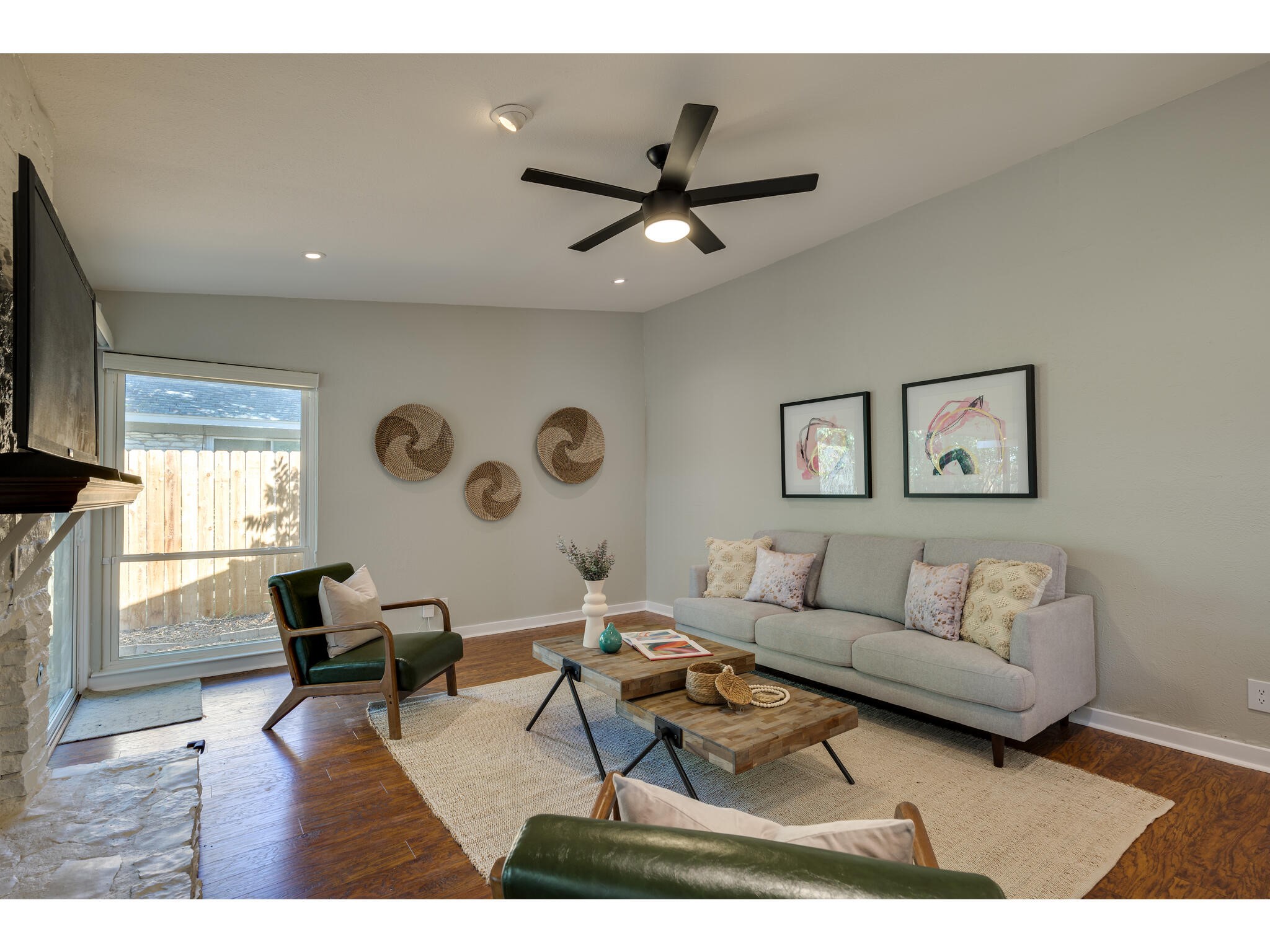3203 Foster Lane Austin, TX 78757 - Photo 15 of 37 a living room with furniture and a flat screen tv