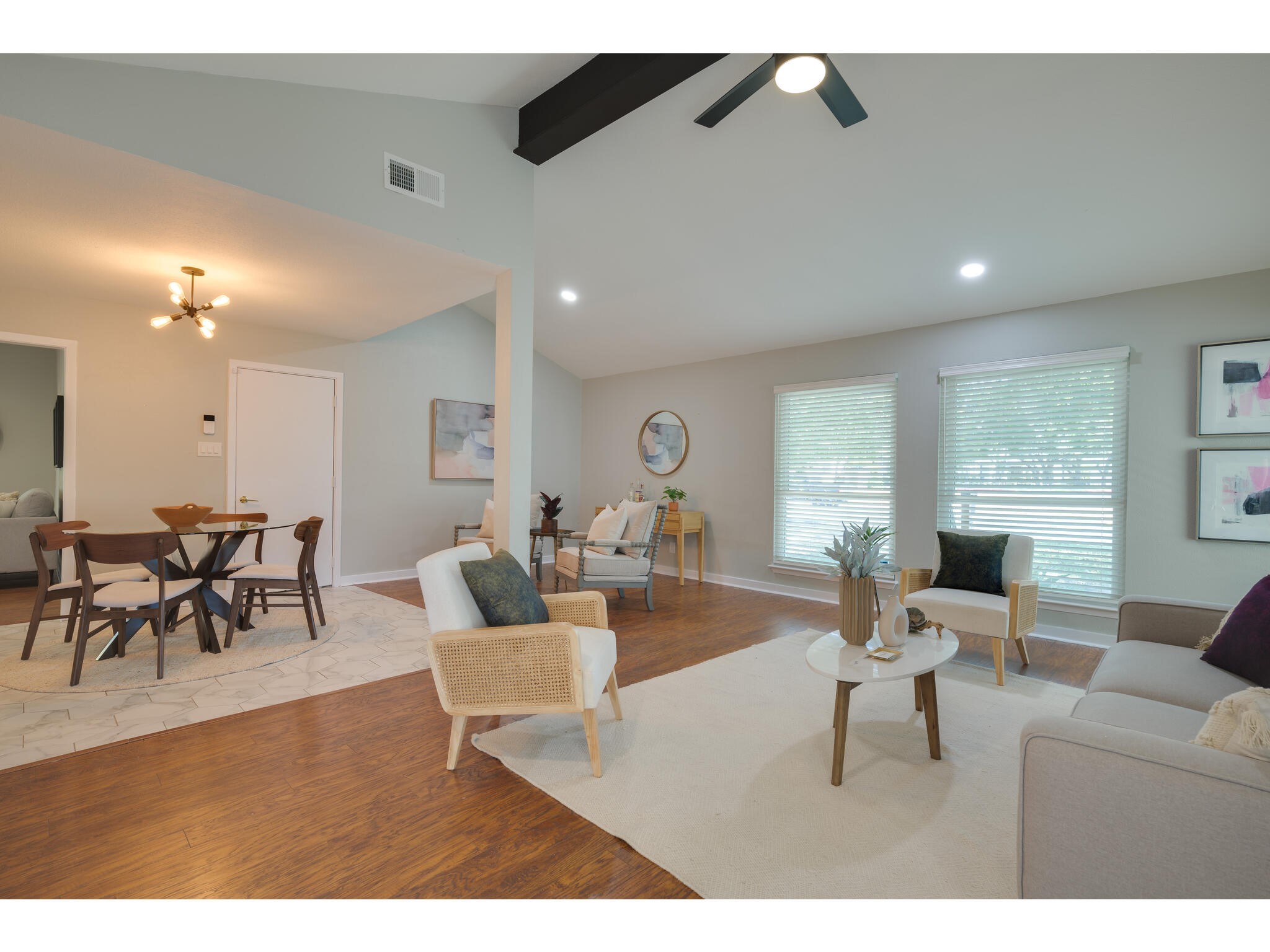 3203 Foster Lane Austin, TX 78757 - Photo 2 of 37 a living room with furniture and a large window
