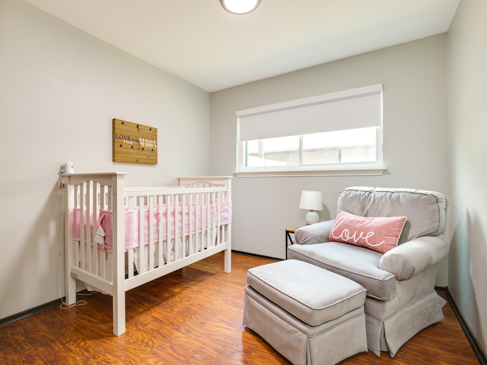 3203 Foster Lane Austin, TX 78757 - Photo 23 of 37 a bedroom with a white bed and a couch