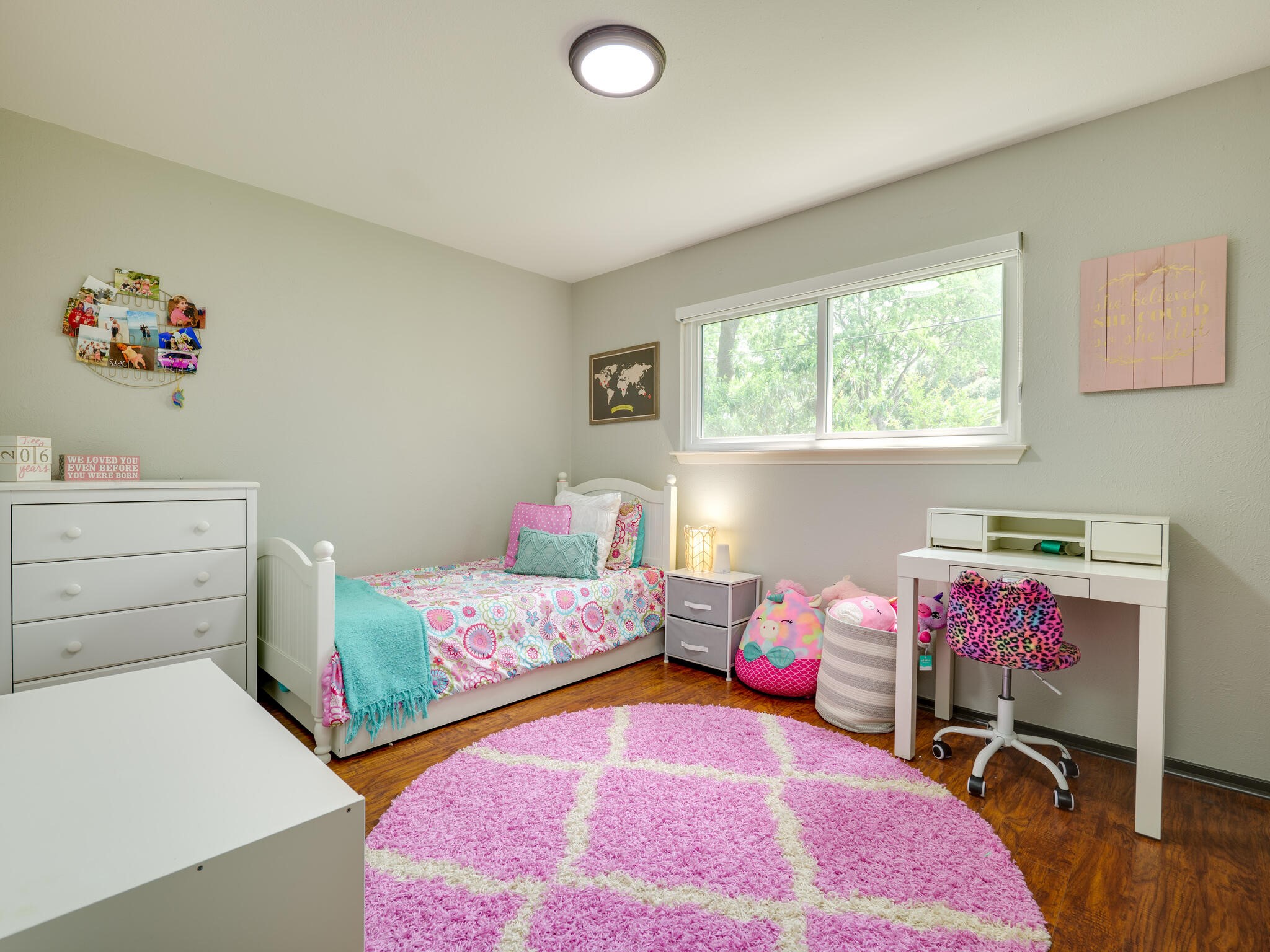 3203 Foster Lane Austin, TX 78757 - Photo 24 of 37 a bedroom with a bed and a window