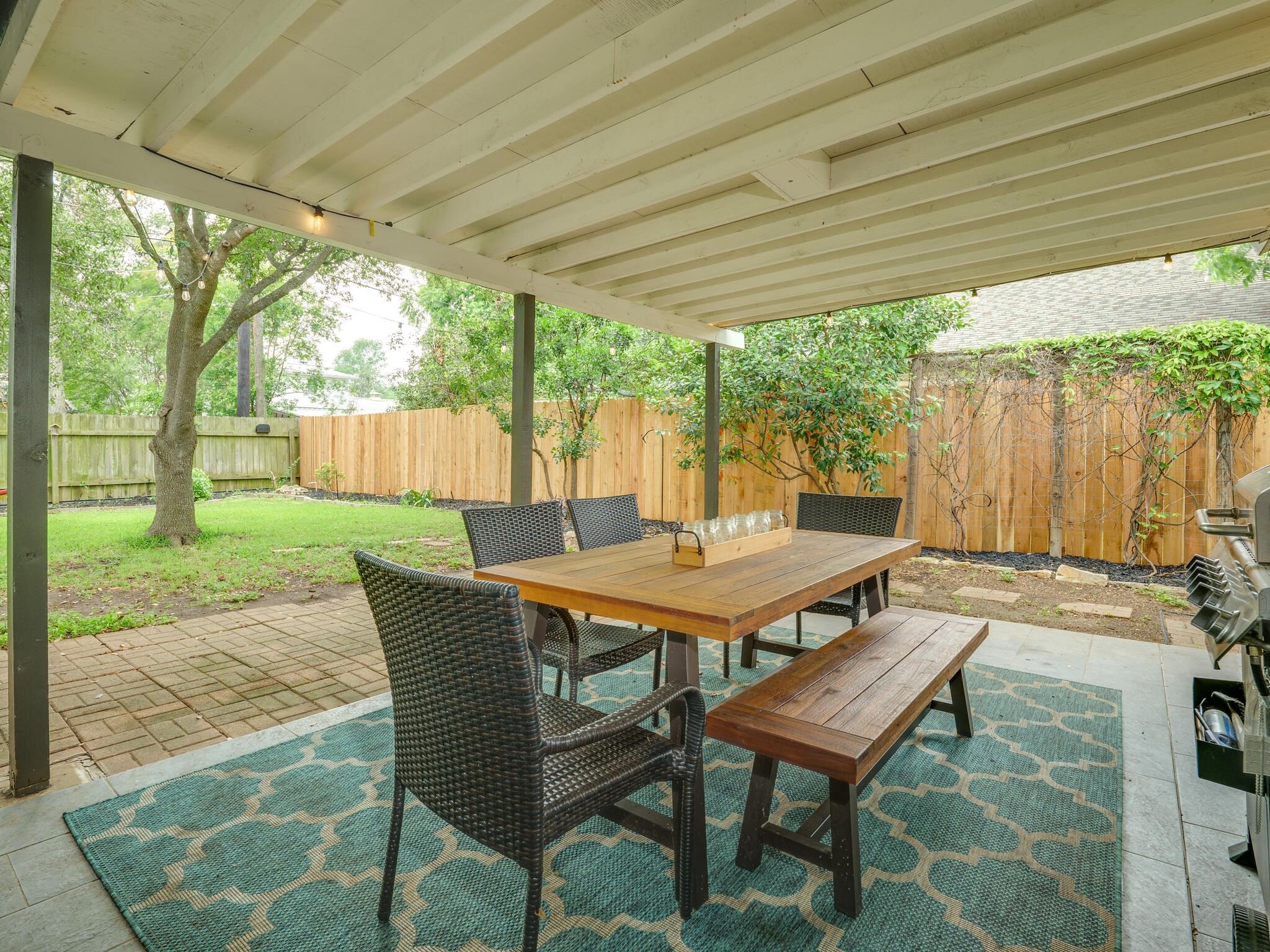 3203 Foster Lane Austin, TX 78757 - Photo 31 of 37 a outdoor dining space with furniture and yard