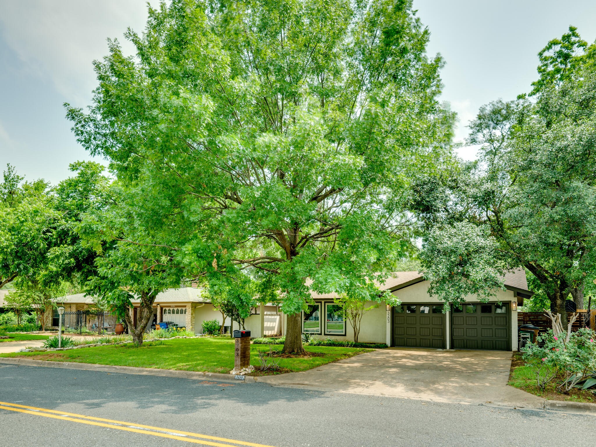 3203 Foster Lane Austin, TX 78757 - Photo 37 of 37 a house view with a outdoor space