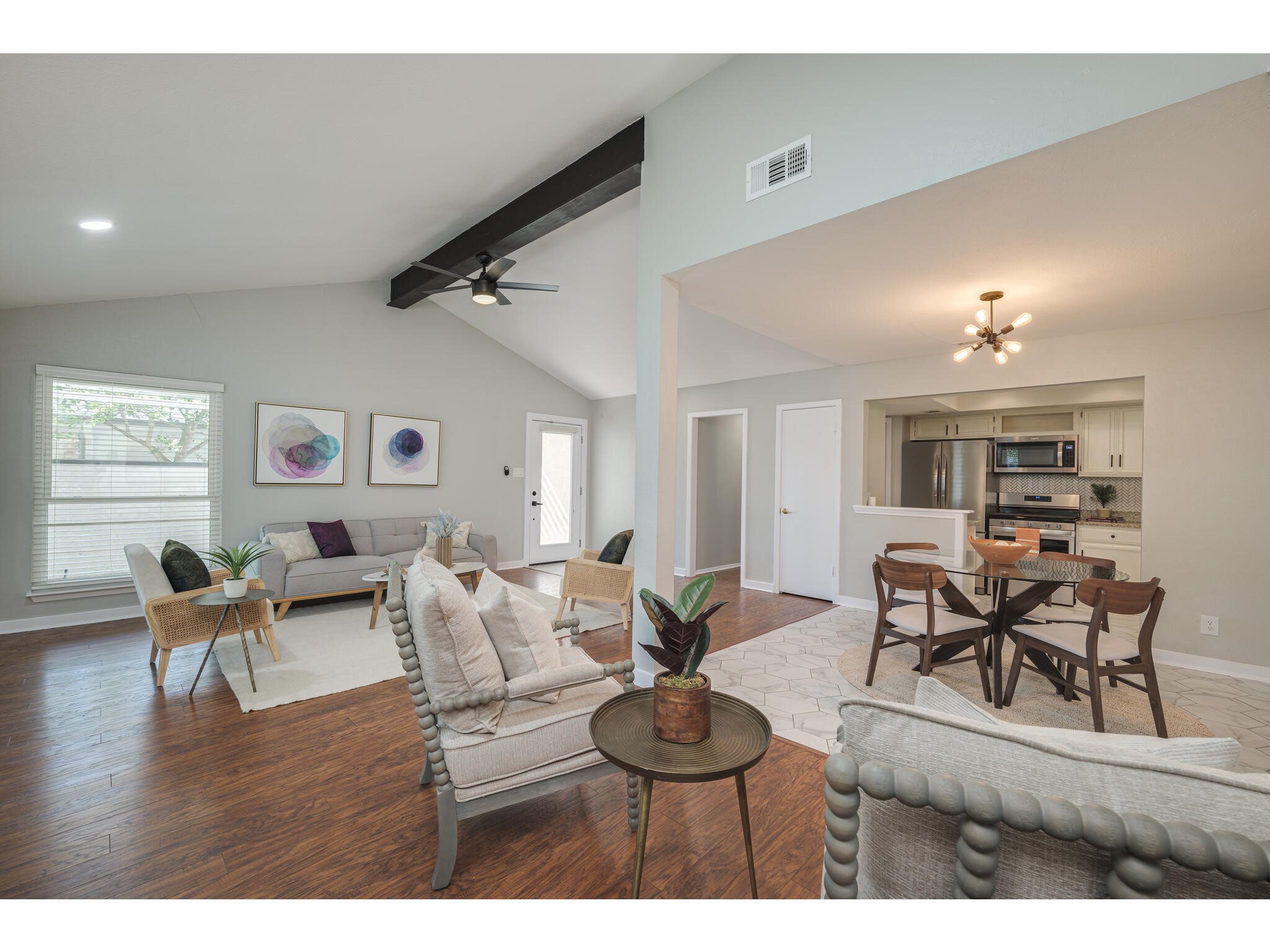 3203 Foster Lane Austin, TX 78757 - Photo 7 of 37 a living room with furniture and a wooden floor